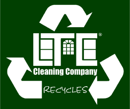 A green recycling logo.